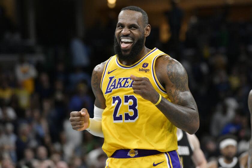 Los Angeles Lakers forward LeBron James (23) looks toward the Memphis Grizzlies' bench during the second half of an NBA basketball game Friday, April 12, 2024, in Memphis, Tenn. (AP Photo/Brandon Dill)