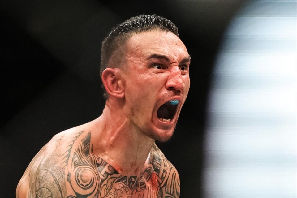 Max Holloway celebrates knockout over Justin Gaethje at UFC 300 (Getty Images)