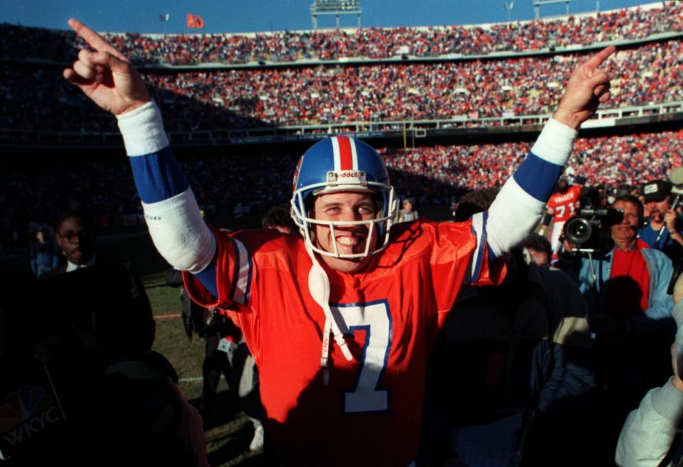 John Elway celebrates victory in the 1989 AFC Championship Game.