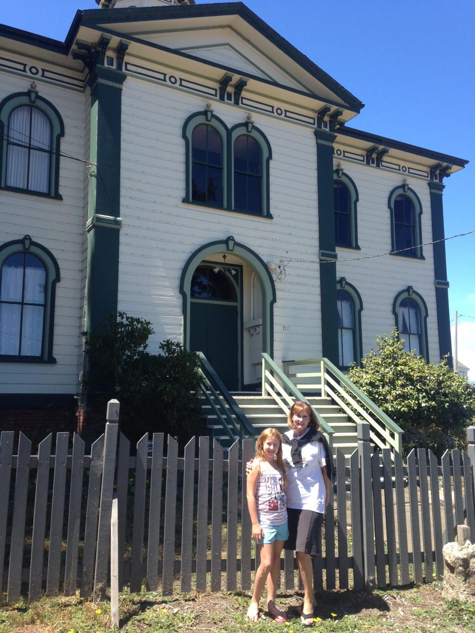Granddaughter Jessica and spouse Susan in front of the old Bodega School made famous in the movie “The Birds."