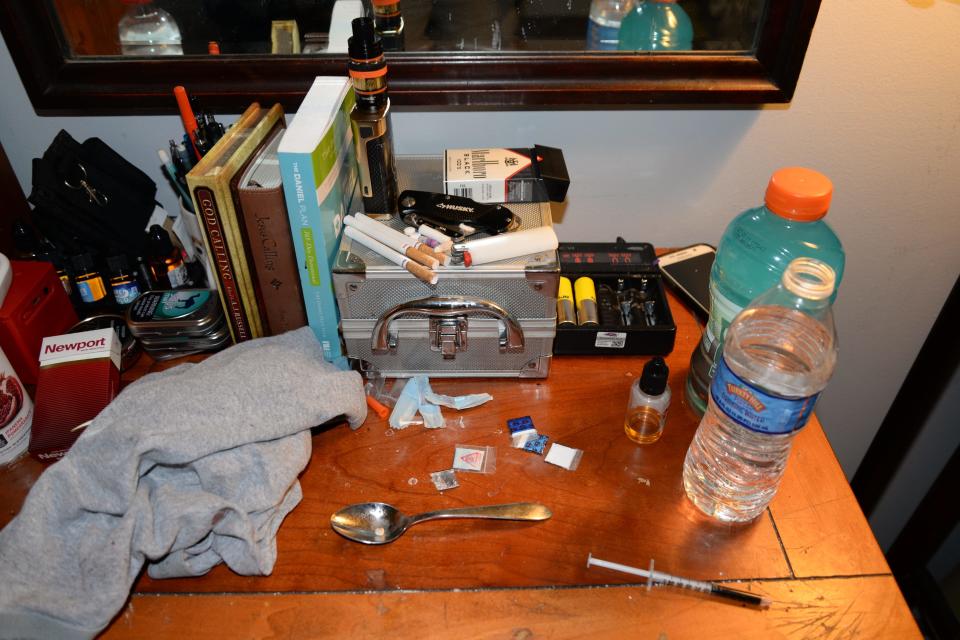 Drug packets and paraphernalia are shown atop&nbsp;the desk of one of the Freedom Ridge Recovery Lodge counselors who died Sunday. (Photo: Chester County District Attorneys Office)