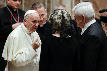 U.S. ambassador to the Holy See Callista Gingrich and her husband talk with Pope Francis during the traditional exchange of the New Year greetings in the Regal Room at the Vatican January 8, 2018. REUTERS/Andrew Medichini/Pool