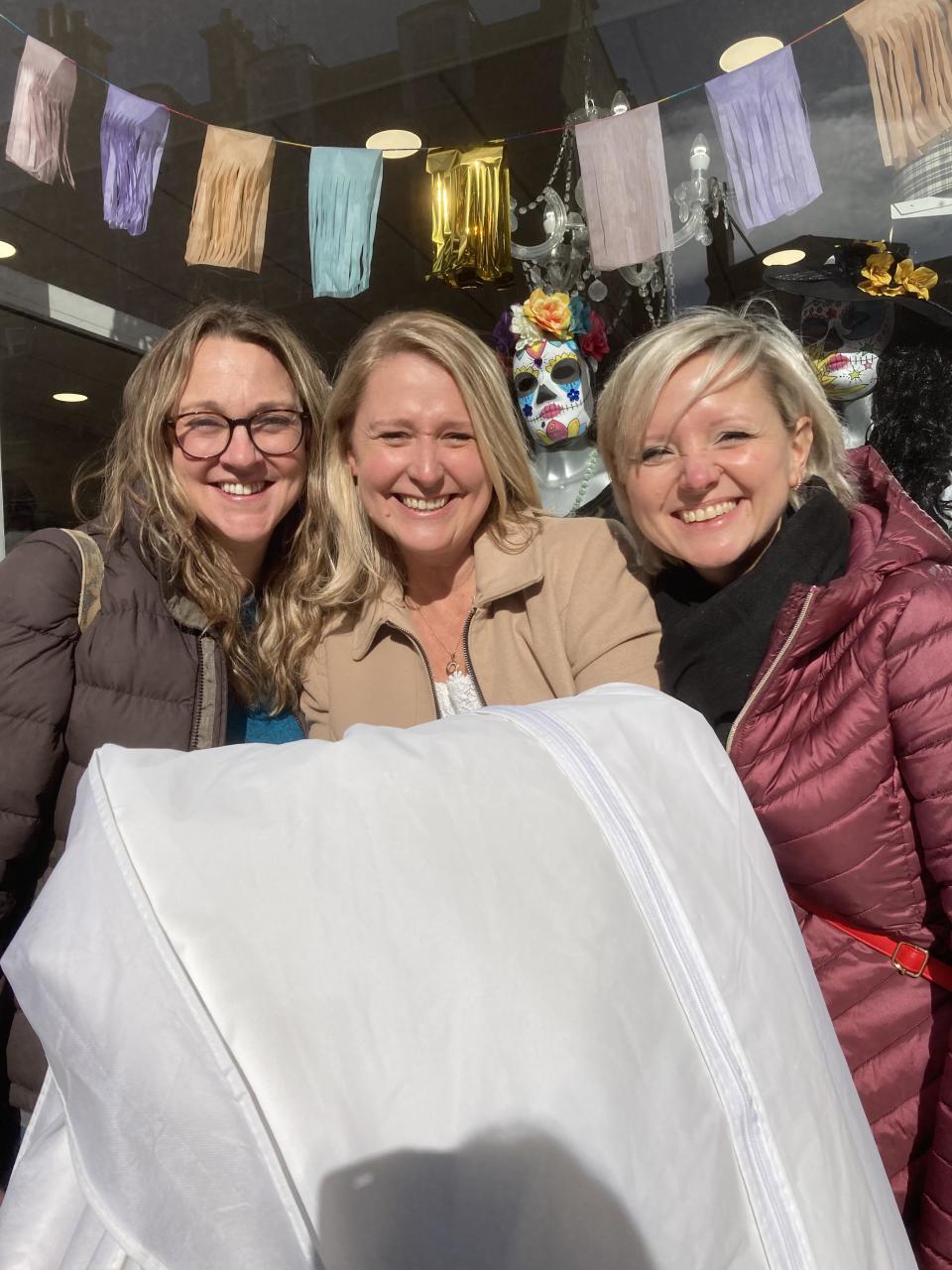 Daisy with her bridesmaids after buying her wedding dress. (SWNS)