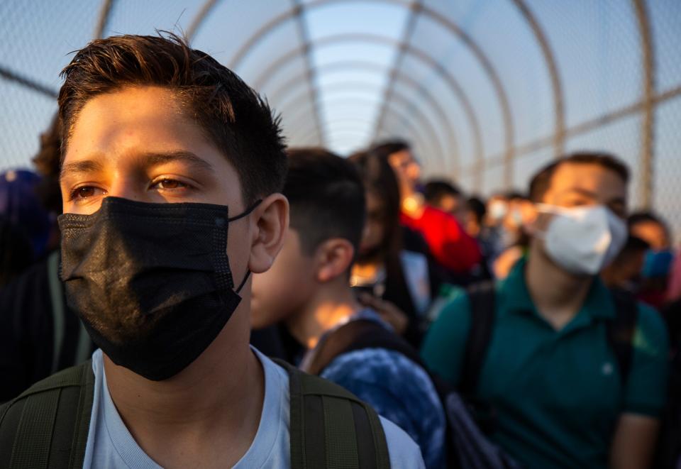 Jesus Rivera, 15, waited with his 11-year-old brother, not pictured, at the Ysleta-Zaragoza Bridge on his way to school in El Paso, Texas, from Ciudad Juarez, Mexico, in August 2021. Both siblings attend school in the U.S. as U.S. citizens.