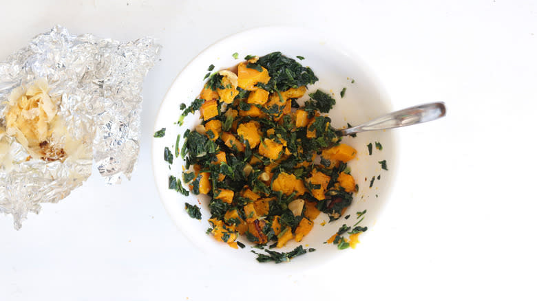 butternut squash and spinach in bowl