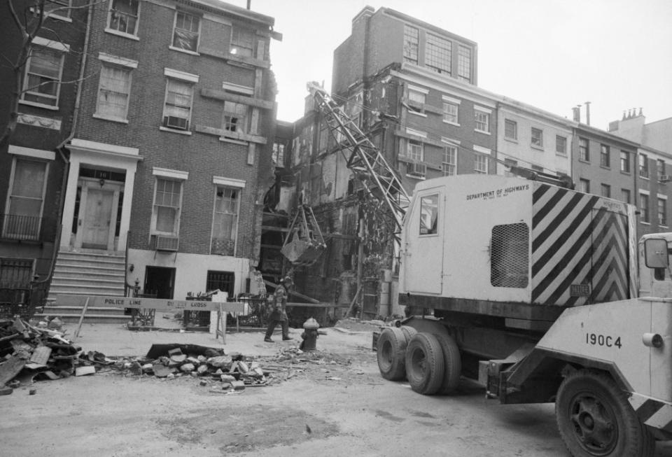 The former residence required a full demolition — and the lot remained vacant for years after. Bettmann Archive