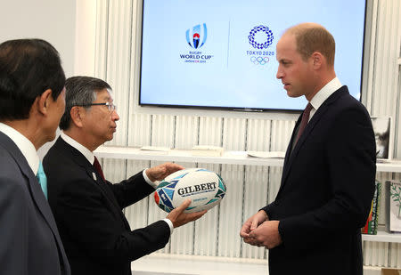 Britain's Prince William is presented with an official rugby ball for the Rugby World Cup 2019 at the official opening of Japan House in London, Britain, September 13, 2018. Tim P. Whitby/Pool via REUTERS