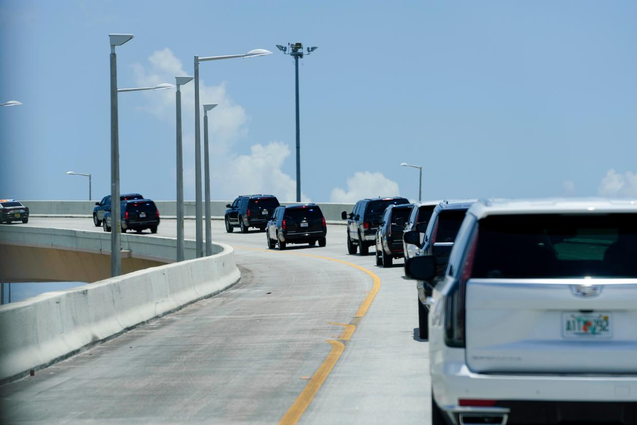 The motorcade for former president Donald Trump is seen Tuesday, 13 June 2023, in Miami (AP)