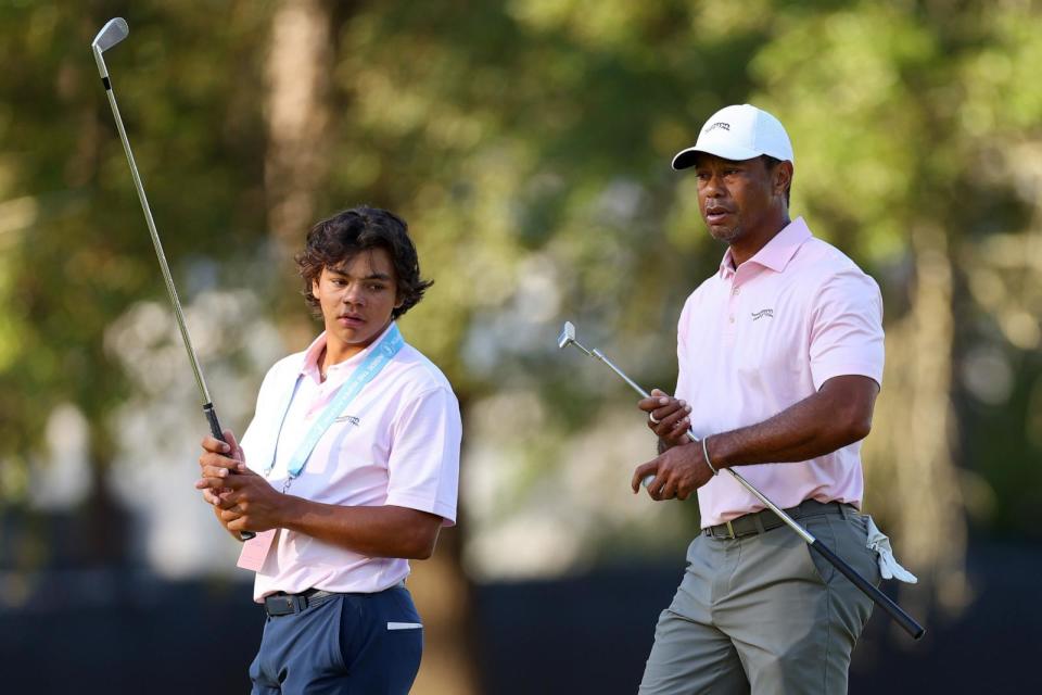 PHOTO: Tiger Woods and his son, Charlie Woods, look on from the second hole during a practice round prior to the U.S. Open at Pinehurst Resort on June 11, 2024 in Pinehurst, N.C. (Andrew Redington/Getty Images)