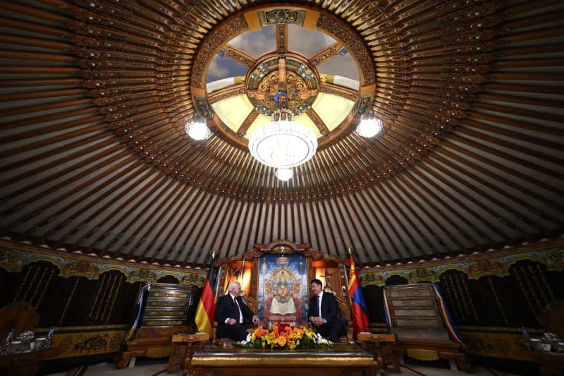 Germany's President Frank-Walter Steinmeier (L) meets with Mongolia's President Ukhnaa Khurelsukh, for talks at the Presidential Palace. Britta Pedersen/dpa