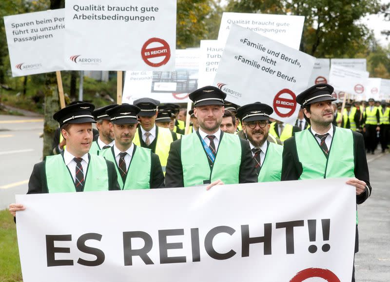 Members of AEROPERS protest in front of the headquarters of Swiss International Air Lines in Kloten