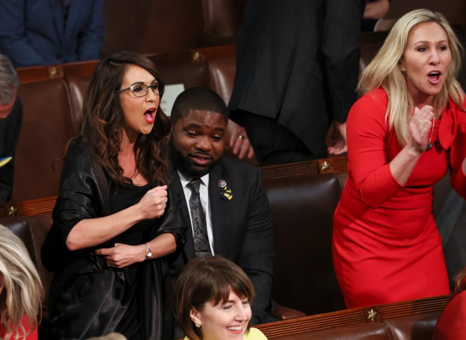 Rep Lauren Boebert and Rep Marjorie Taylor Greene scream during President Joe Biden’s 2022 State of the Union address (Getty Images)