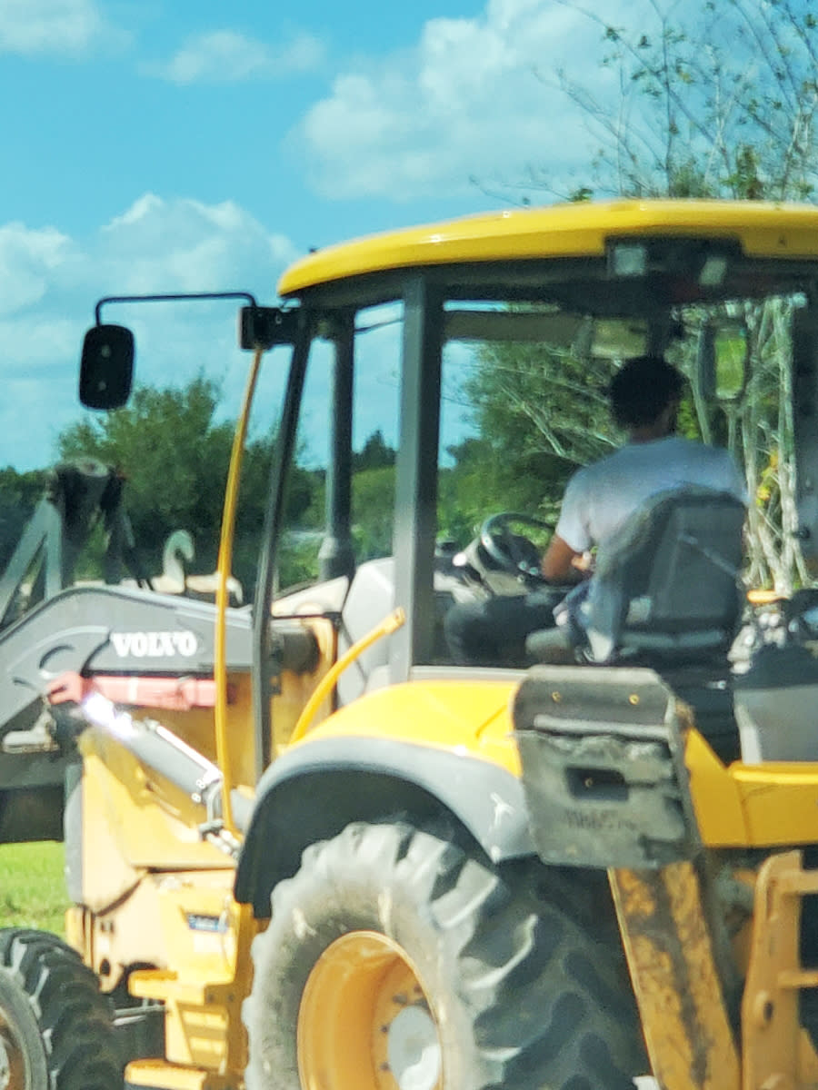 A man allegedly used a bulldozer to rip Biden campaign signs in Haines City, Fla. (Courtesy Cornelius Marion)