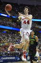 Wisconsin forward Frank Kaminsky (44) drives as Baylor center Isaiah Austin (21) watches during the second half in a regional semifinal NCAA college basketball tournament game, Thursday, March 27, 2014, in Anaheim, Calif. (AP Photo/Mark J. Terrill)