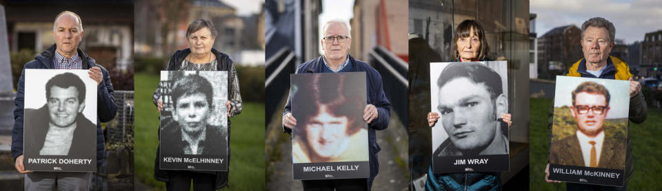 (L to R) Tony Doherty, son of Patrick Doherty, Jean Hegarty, sister of Kevin McElhinney, John Kelly, brother of Michael Kelly, Margaret Wray, brother of Jim Wray, and Joe McKinney, brother of William McKinney, hold images of their loved ones killed on Bloody Sunday (Liam McBurney/PA)