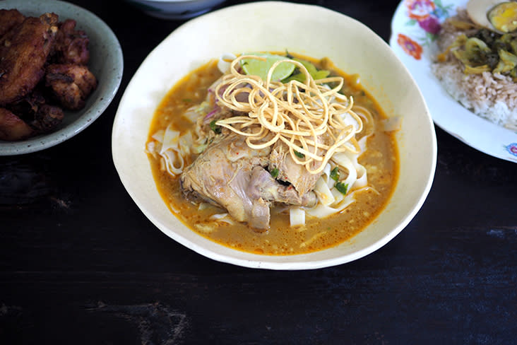 Even though the Khao Soi Ga is served with a watery broth, it is tasty plus you also get a delicious, huge piece of chicken where the meat is falling off the bone