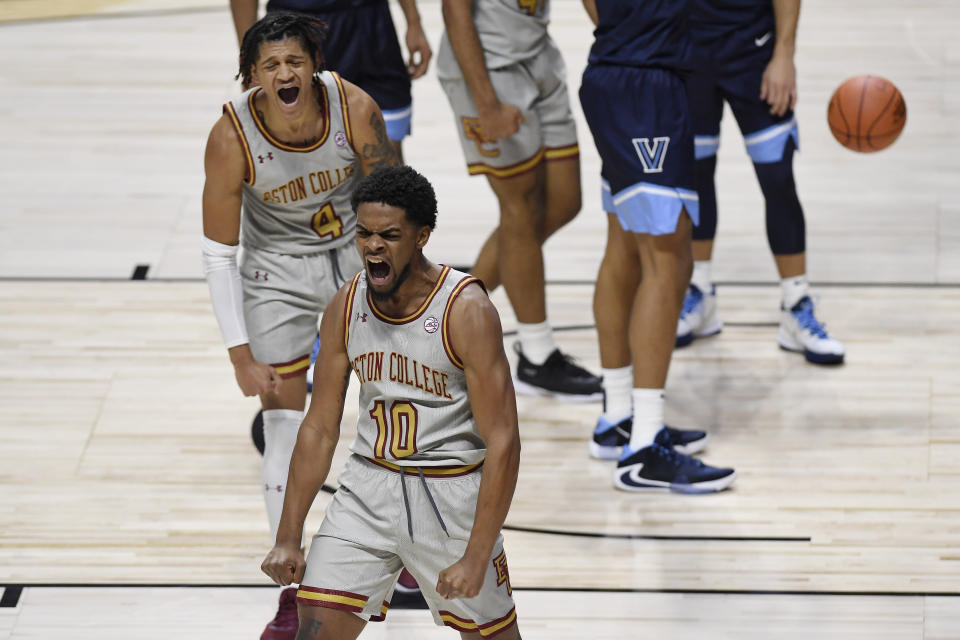 Boston College's Wynston Tabbs (10) and Makai Ashton-Langford (4) react during the second half of the team's NCAA college basketball game against Villanova, Wednesday, Nov. 25, 2020, in Uncasville, Conn. (AP Photo/Jessica Hill)