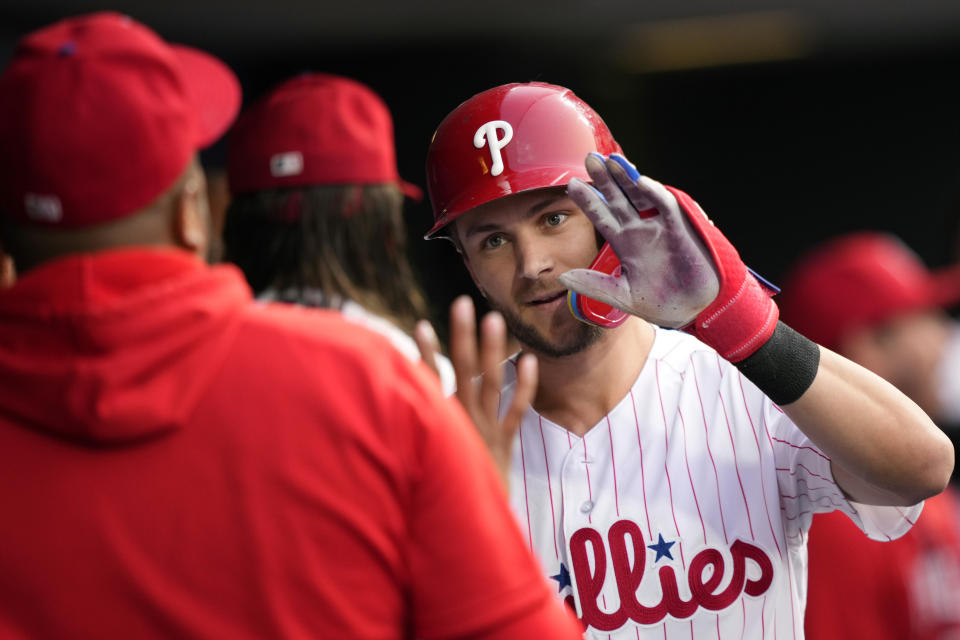 Philadelphia Phillies' Trea Turner celebrates in the dugout after hitting a home run against Detroit Tigers pitcher Joey Wentz during the third inning of a baseball game, Monday, June 5, 2023, in Philadelphia. (AP Photo/Matt Slocum)