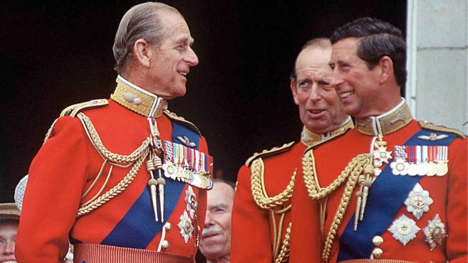 Prince Charles and Prince Philip sharing a joke