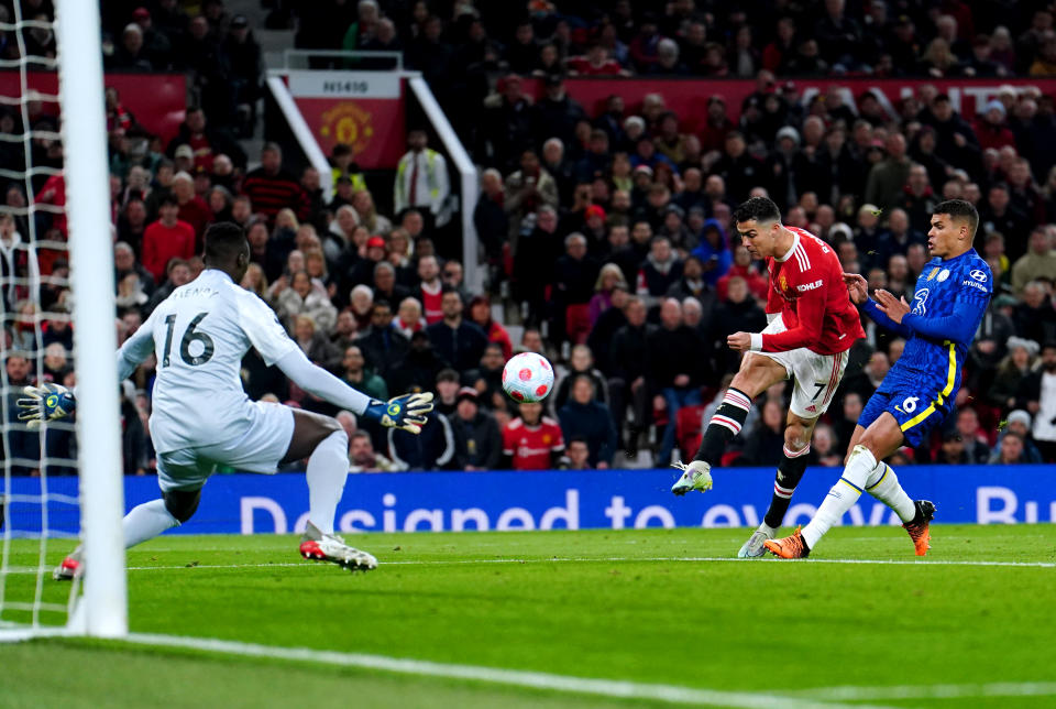 Manchester United's Cristiano Ronaldo scores their side's first goal of the game during the Premier League match at Old Trafford, Manchester. Picture date: Thursday April 28, 2022. (Photo by Martin Rickett/PA Images via Getty Images)