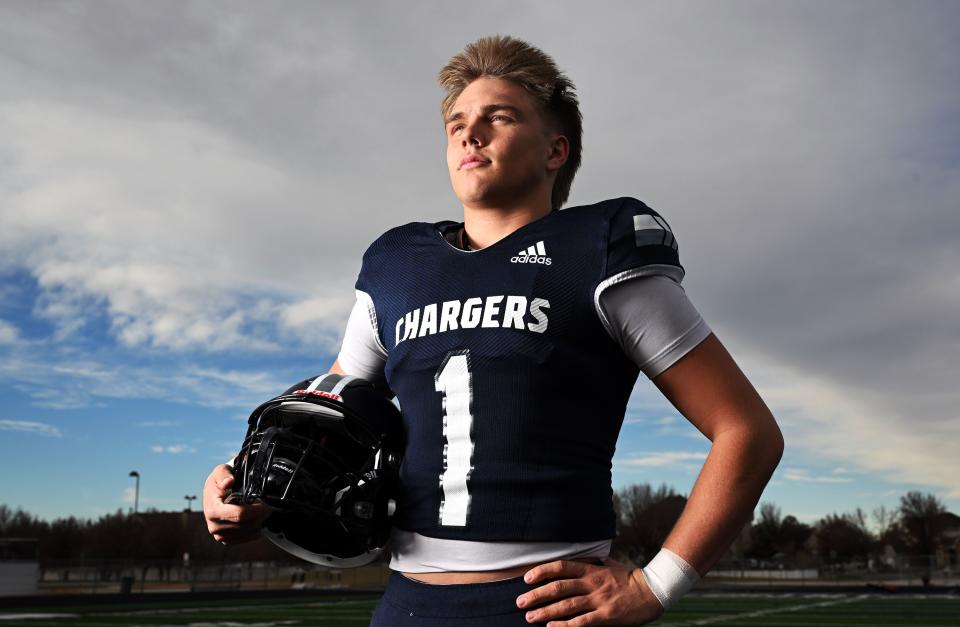 Corner Canyon’s Isaac Wilson poses for Mr. Football photos in Draper on Wednesday, Dec. 6, 2023. | Scott G Winterton, Deseret News