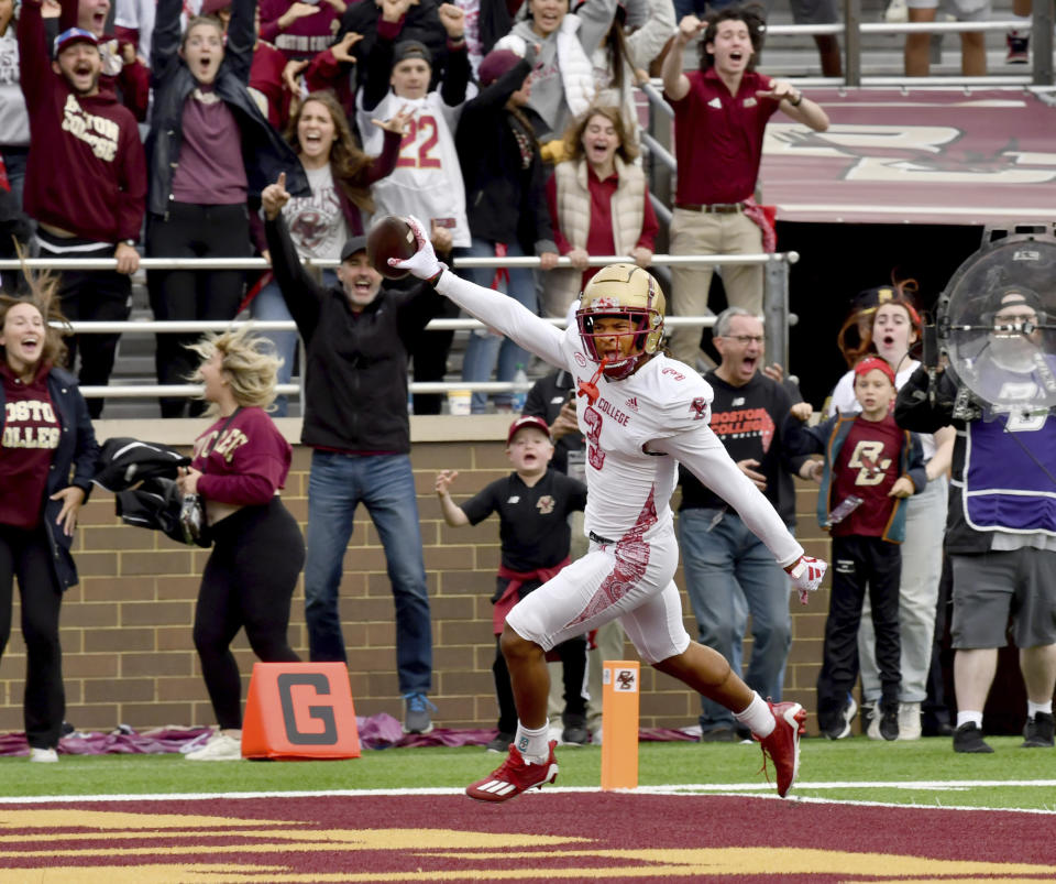 Boston College defensive back Khari Johnson returns a Florida State fumble for a touchdown during the second half of an NCAA college football game Saturday, Sept. 16, 2023 in Boston. (AP Photo/Mark Stockwell)