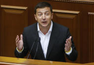 FILE - In this file photo taken on Aug. 29, 2019, Ukrainian President Volodymyr Zelenskiy speaks to newly elected Ukrainian parliament deputies during parliament session in Kyiv, Ukraine. Zelenskiy, the comedian elected Ukraine’s leader in April, took office pledging to focus on ending the deadly separatist fighting in the country’s east, fomented by Russia. But now, barely 100 days in power, he finds himself at the center of a political furor involving the United States, Ukraine’s friend and backer. (AP Photo/Efrem Lukatsky, File)