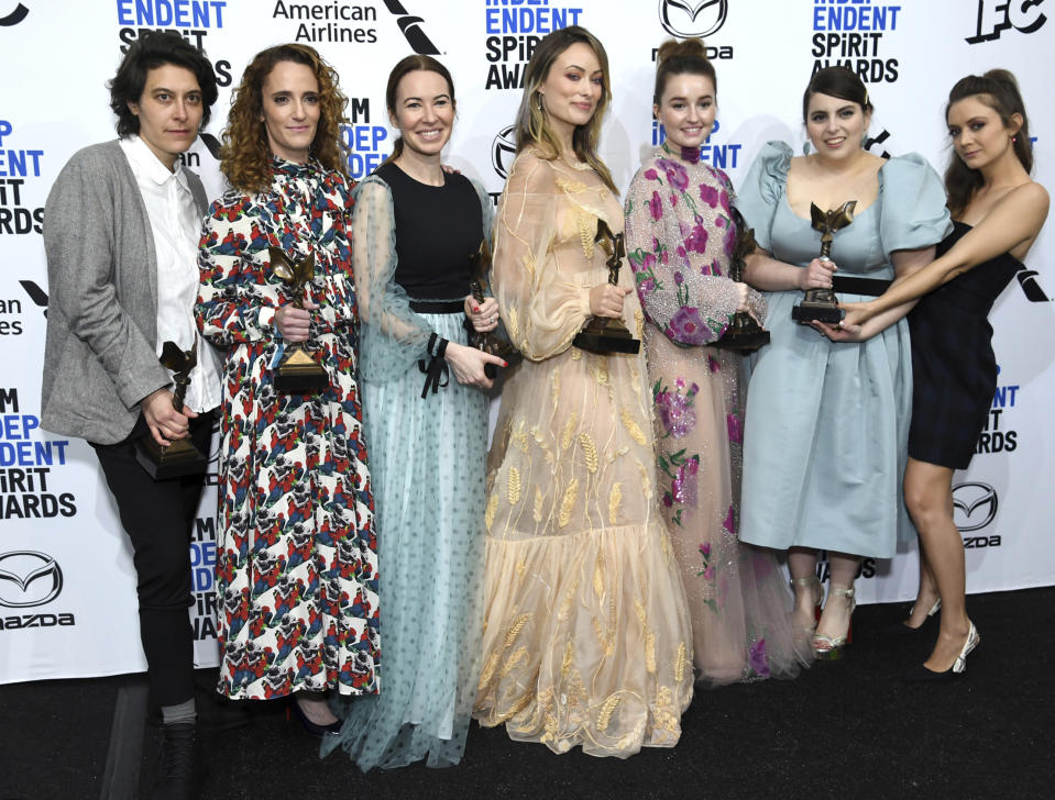 Chelsea Barnard, from left, Susanna Fogel, Katie Silberman, Olivia Wilde, Kaitlyn Dever, Beanie Feldstein, and Billie Lourd pose in the press room with their awards for best first feature for "Booksmart" at the 35th Film Independent Spirit Awards on Saturday, Feb. 8, 2020, in Santa Monica, Calif. (Photo by Richard Shotwell/Invision/AP)
