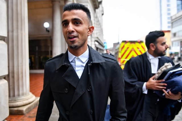 Defendant Shakeel Afsar leaves Birmingham Civil Justice Centre