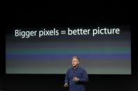 Craig Federighi, Senior VP of Software Engineering at Apple Inc talks about the camera in the new iPhone 5S during Apple Inc's media event in Cupertino, California September 10, 2013. REUTERS/Stephen Lam (UNITED STATES - Tags: BUSINESS SCIENCE TECHNOLOGY BUSINESS TELECOMS)