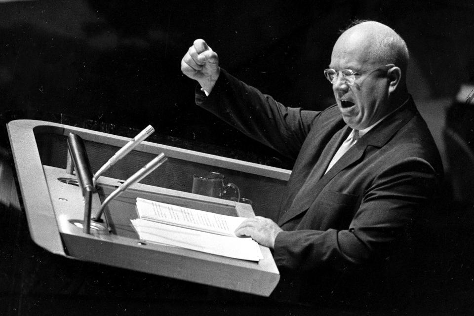 FILE - Nikita Khrushchev, Soviet premier and the First Secretary of the Communist Party of the Soviet Union, gestures with his fist to emphasize a remark during his address before the United Nations General Assembly in New York City on Sept. 23, 1960. Many observers say the closest that the world has come to full nuclear war was in the 1962 confrontation between the United States and the USSR over the presence in Cuba of Soviet nuclear missiles, which Khrushchev sent in response to the US placing nuclear-capable missiles in Turkey. (AP Photo/File)
