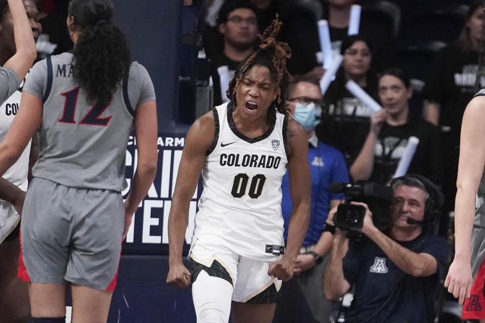 Colorado's Jaylyn Sherrod (00) celebrates getting fouled by Arizona during the second half of an NCAA college basketball game Friday, Jan. 5, 2024, in Tucson, Ariz. (AP Photo/Darryl Webb)