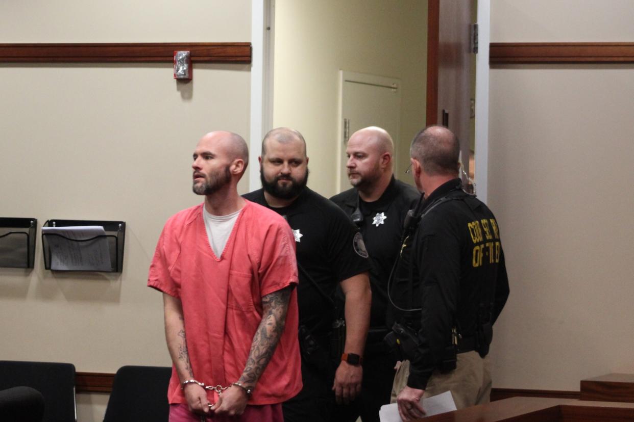 Timothy Delehanty, now 37, appears for a preliminary hearing in Kenton County District Court. Delehanty, who is already murder in connection with a 2006 cold case, is also accused of trying to kill another inmate at the Kenton County jail.