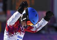 Canada's Marianne Leeson reacts during the women's snowboard parallel giant slalom finals at the 2014 Sochi Winter Olympic Games in Rosa Khutor February 19, 2014. REUTERS/Dylan Martinez (RUSSIA - Tags: OLYMPICS SPORT SNOWBOARDING)