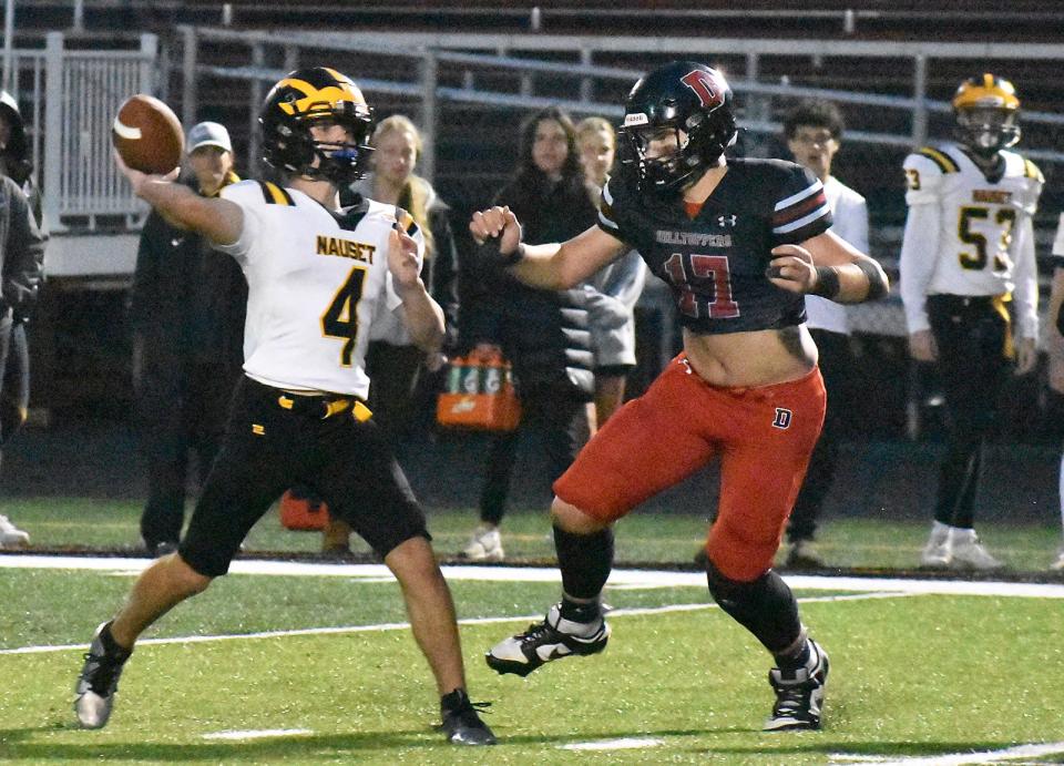 Durfee's Cooper Long runs at Nauset's Brendan Peno during Friday's non-league game at B.M.C. Durfee High School Sept. 29, 2023