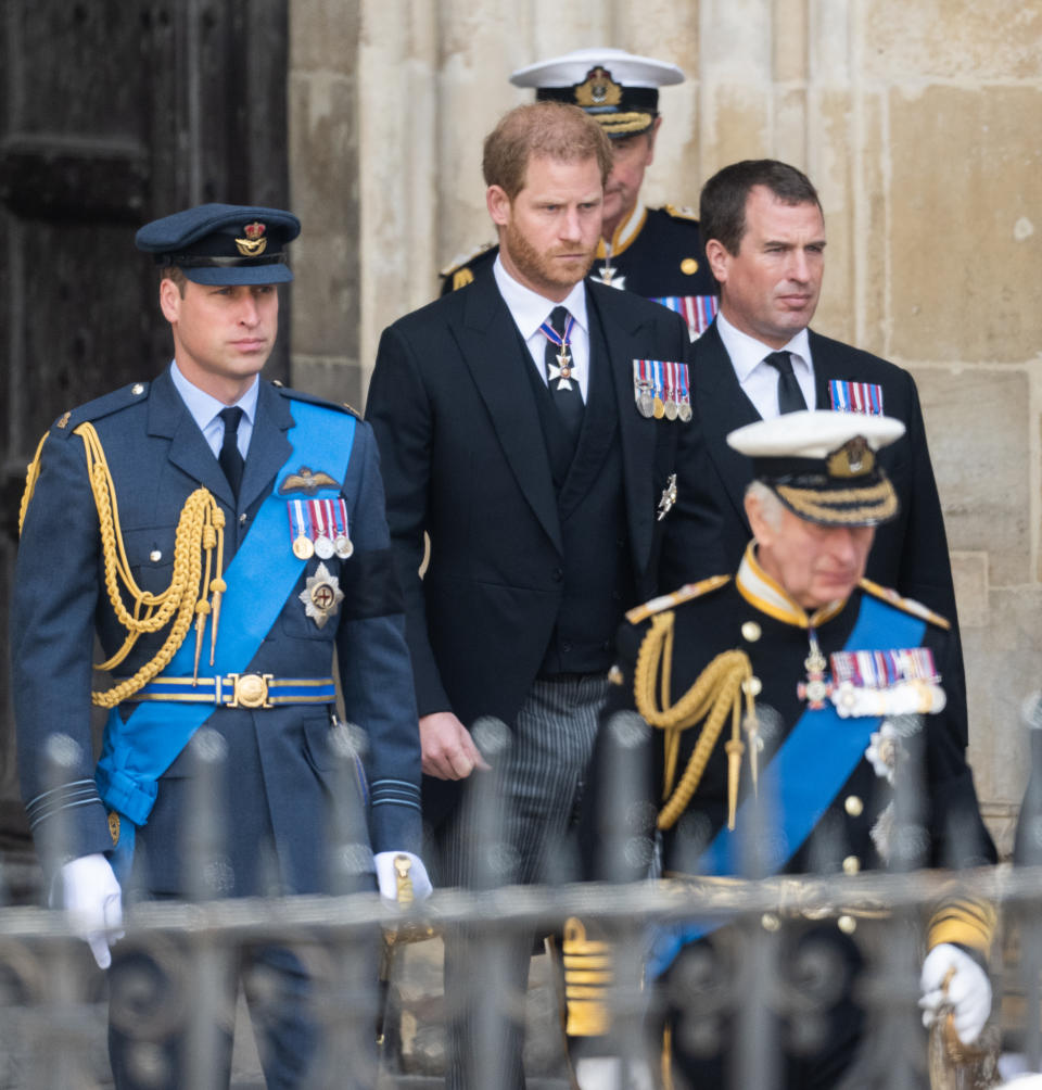 LONDON, ENGLAND - SEPTEMBER 19: Prince William, Prince of Wales, Prince Harry, Duke of Sussex, Peter Phillips and King Charles III during the State Funeral of Queen Elizabeth II at Westminster Abbey on September 19, 2022 in London, England.  Elizabeth Alexandra Mary Windsor was born in Bruton Street, Mayfair, London on 21 April 1926. She married Prince Philip in 1947 and ascended the throne of the United Kingdom and Commonwealth on 6 February 1952 after the death of her Father, King George VI. Queen Elizabeth II died at Balmoral Castle in Scotland on September 8, 2022, and is succeeded by her eldest son, King Charles III. (Photo by Samir Hussein/WireImage)