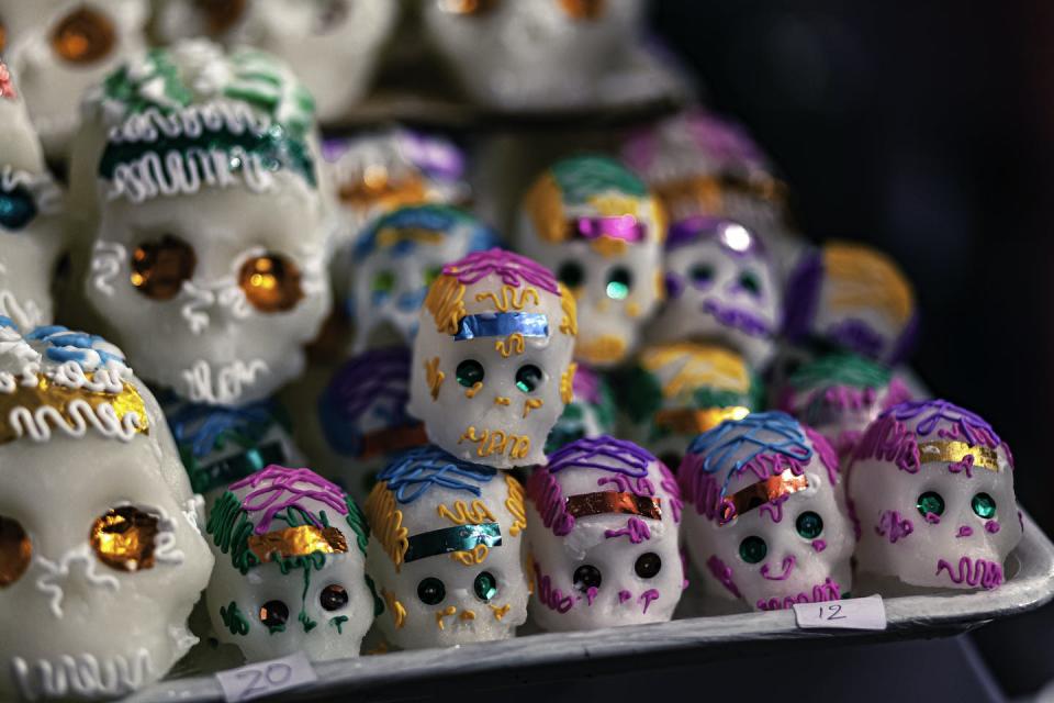 Mexican candy in the shape of sugar skulls being sold on the occasion of the Day of the Dead in Michoacan, in the western part of Mexico. <a href="https://www.gettyimages.com/detail/photo/sugar-skulls-on-the-day-of-the-dead-royalty-free-image/1274350200?adppopup=true" rel="nofollow noopener" target="_blank" data-ylk="slk:©fitopardo/Moment via Getty images;elm:context_link;itc:0;sec:content-canvas" class="link ">©fitopardo/Moment via Getty images</a>