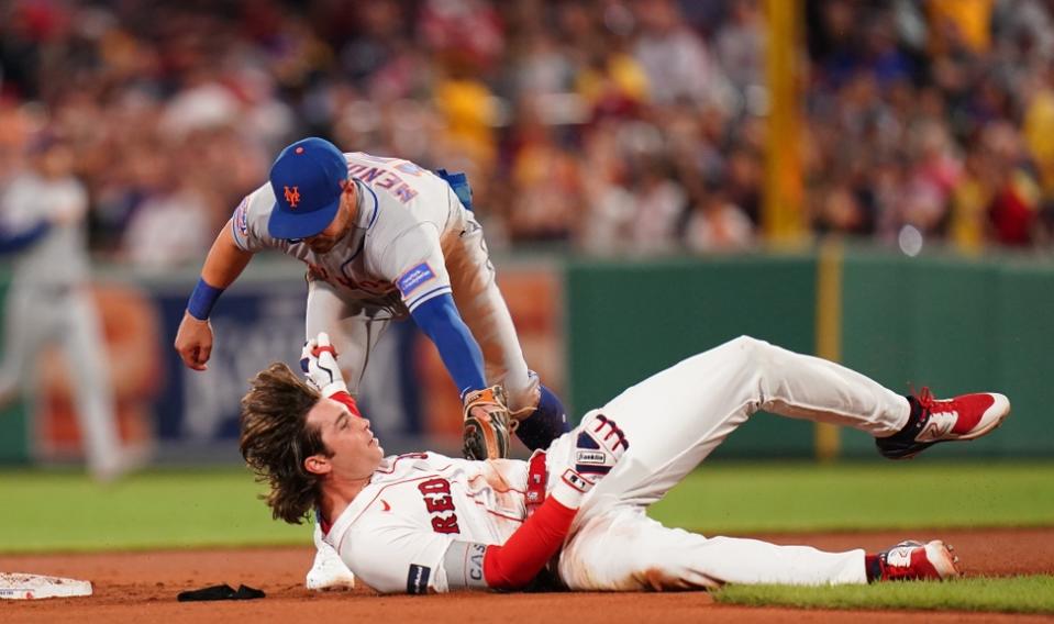 Boston Red Sox first baseman Triston Casas (36) tagged out at seconds by New York Mets second baseman Danny Mendick (15) in the fifth inning at Fenway Park.
