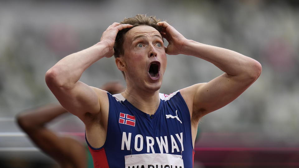 Karsten Warholm, of Norway, reacts after winning the men's 400-meter hurdles. (AP Photo/Petr David Josek)