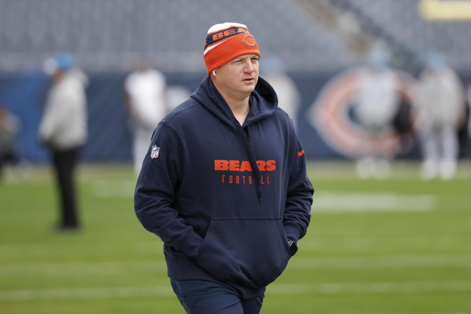 FILE - Chicago Bears offensive coordinator Luke Getsy walks on the field before an NFL football game against the Detroit Lions, Sunday, Dec. 10, 2023, in Chicago. The Chicago Bears are sticking with coach Matt Eberflus in 2024 after the team showed improvement over the second half of the season. There will, however, be some big changes to his staff. The Bears have fired most of their offensive assistants, including coordinator Luke Getsy after two seasons.(AP Photo/Kamil Krzaczynski, File)