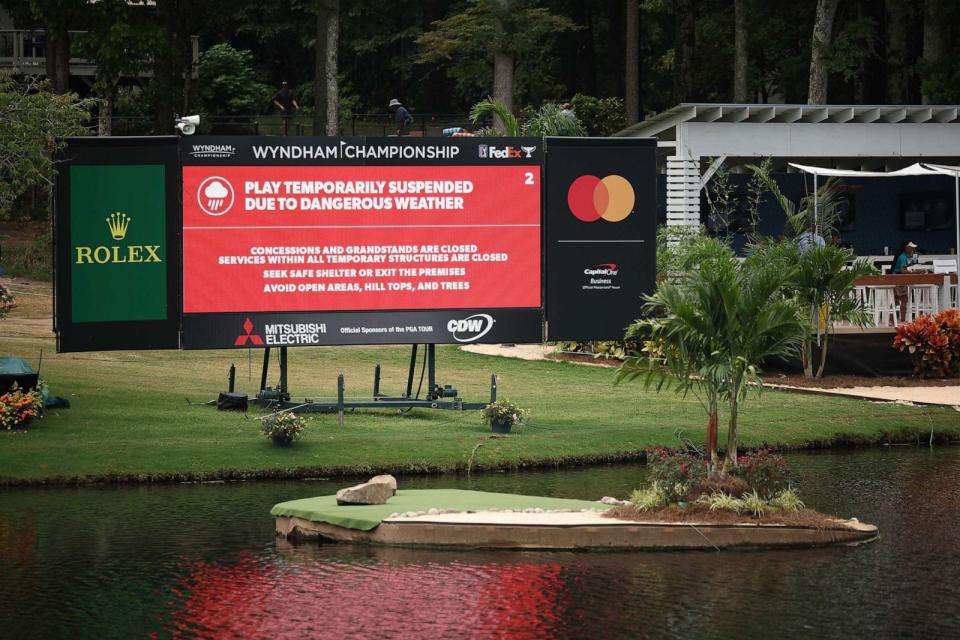 PHOTO: General view of a scoreboard showing that play has been suspended due to dangerous weather during the final round of the Wyndham Championship at Sedgefield Country Club on Aug. 6, 2023 in Greensboro, N.C. (Jared C. Tilton/Getty Images)