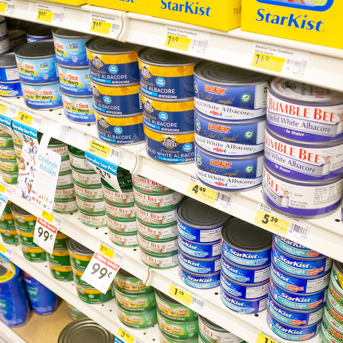 canned tuna on grocery store shelves