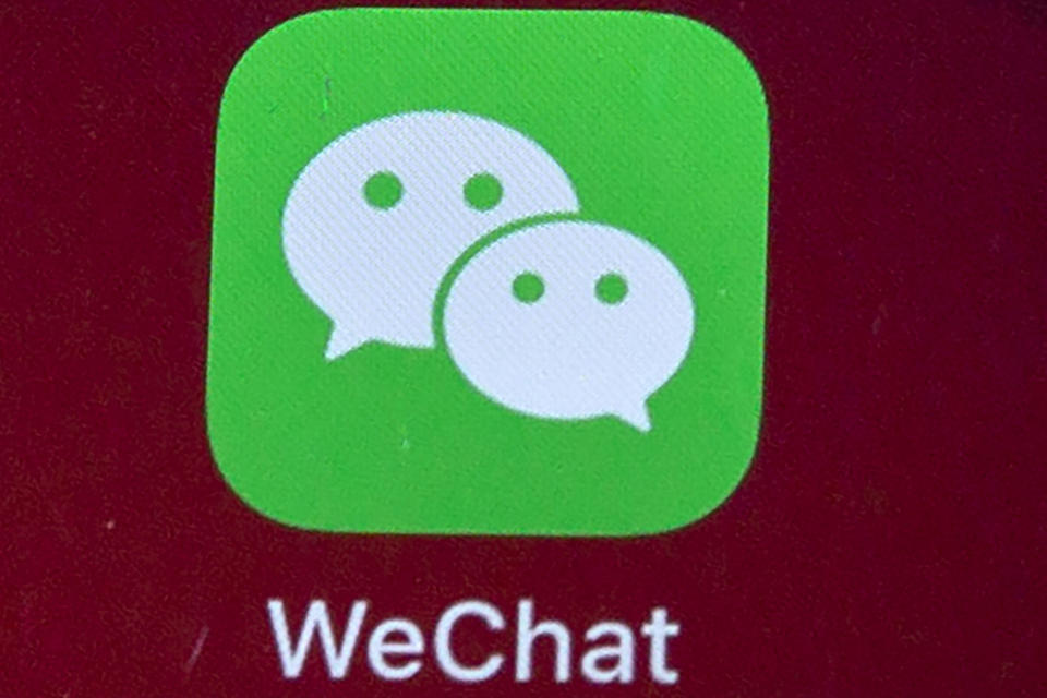 FILE - Icon for the smartphone app WeChat is seen on a smartphone screen in Beijing on Aug. 7, 2020. Australian Prime Minister Scott Morrison’s account on Chinese-owned social media platform WeChat was taken over and renamed, and a lawmaker on Monday, Jan. 24, 2022 accused China's leaders of political interference. (AP Photo/Mark Schiefelbein, File)