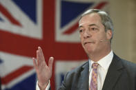 Brexit Party leader Nigel Farage speaks during a party rally, as part of General Election campaign trail, in Ilford, Essex, England, Wednesday, Nov. 13,2019. Britain goes to the polls on Dec. 12. (Joe Giddens/PA via AP)