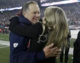 <p>New England Patriots head coach Bill Belichick hugs his girlfriend Linda Holliday after the AFC championship NFL football game against the Pittsburgh Steelers, Sunday, Jan. 22, 2017, in Foxborough, Mass. The Patriots won 36-17 to advance to the Super Bowl. (AP Photo/Elise Amendola) </p>