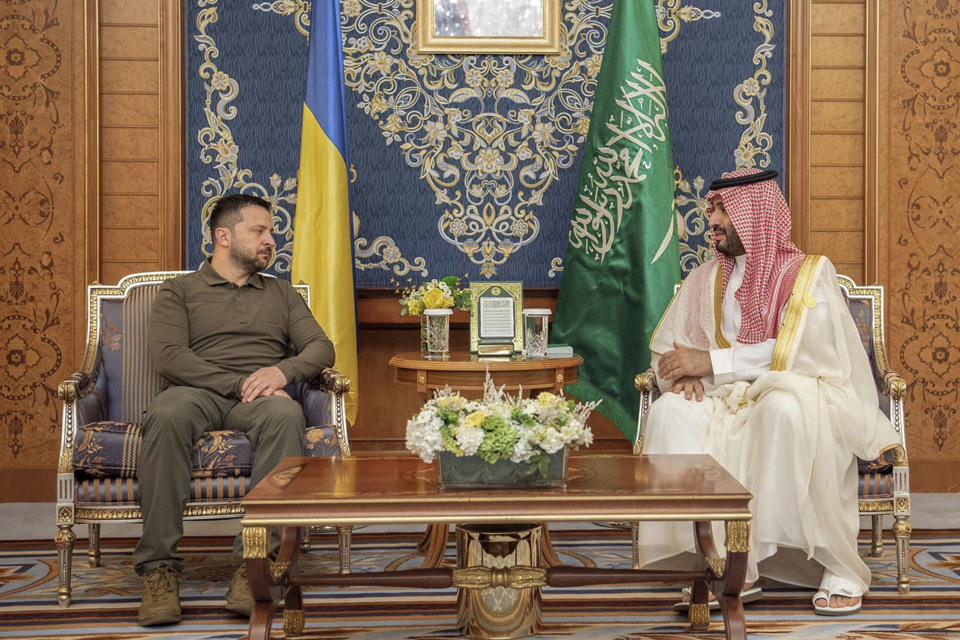 In this photo provided by Saudi Press Agency, SPA, Saudi Crown Prince Mohammed bin Salman meets with Ukraine's President Volodymyr Zelenskyy, during the Arab summit in Jeddah, Saudi Arabia, Friday, May 19, 2023. (Saudi Press Agency via AP)