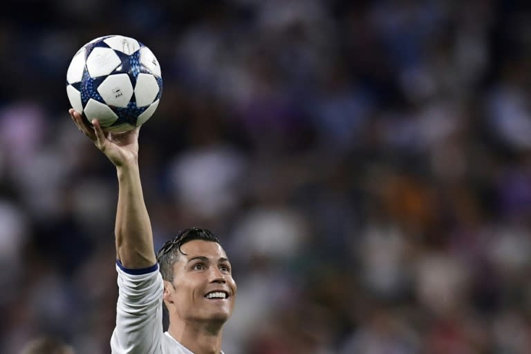 Real Madrid's forward Cristiano Ronaldo and Real host Atletico Madrid in the Champions League semi-finals