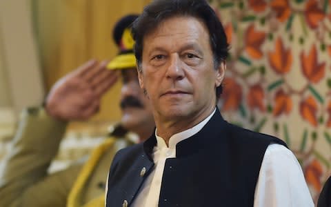 Imran Khan has warned the continued suppression of Indian Muslims could lead to millions fleeing the country - Credit: Aamir Qureshi/AFP