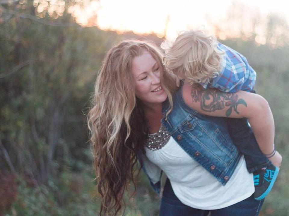 Ashley Ames shown with her son.  (Brittany Hunter/This Life Photography - image credit)