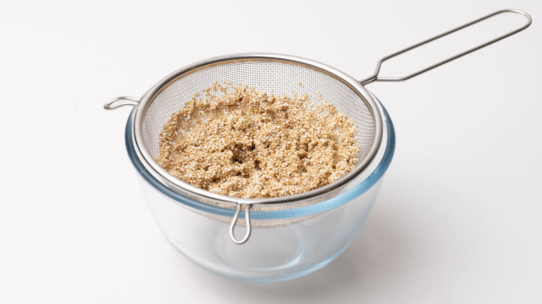 rinsed quinoa in mesh strainer